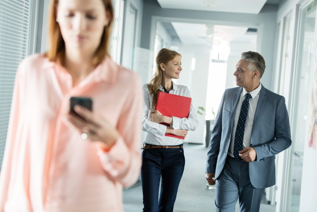An agent walking clients through a property