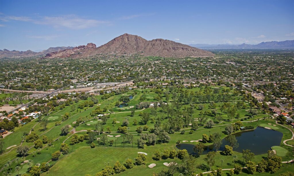 An aerial view of an Arizona valley community and golf course