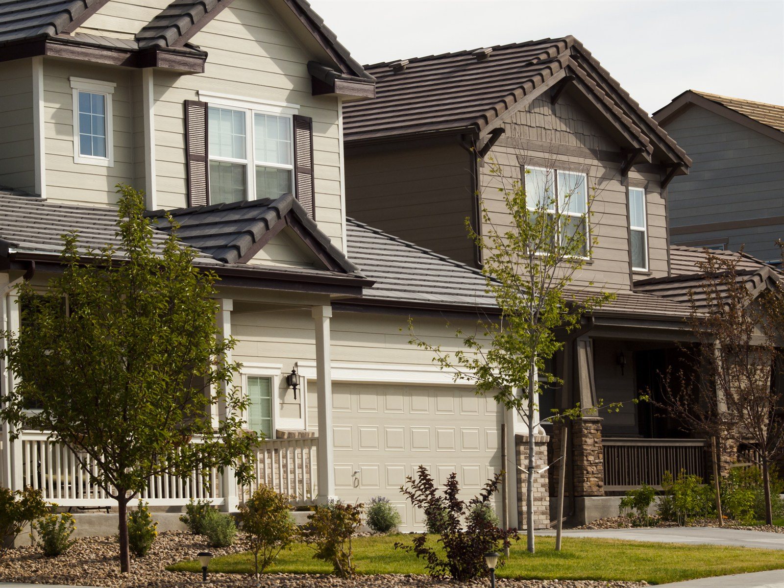 Two-storey suburban homes on a landscaped street