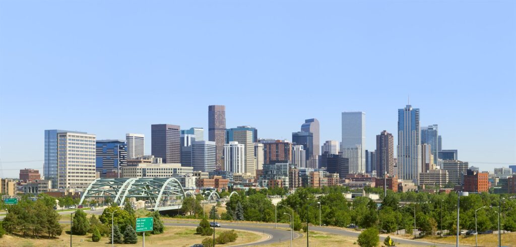 Denver skyline with the Rocky Mountains behind