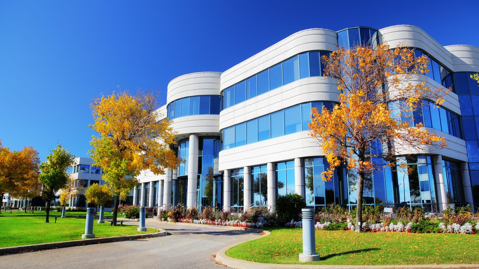 A modern low-rise commercial office building financed with a commercial real estate loan