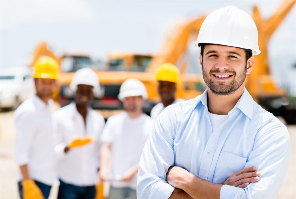 A construction crew in hard hats on site
