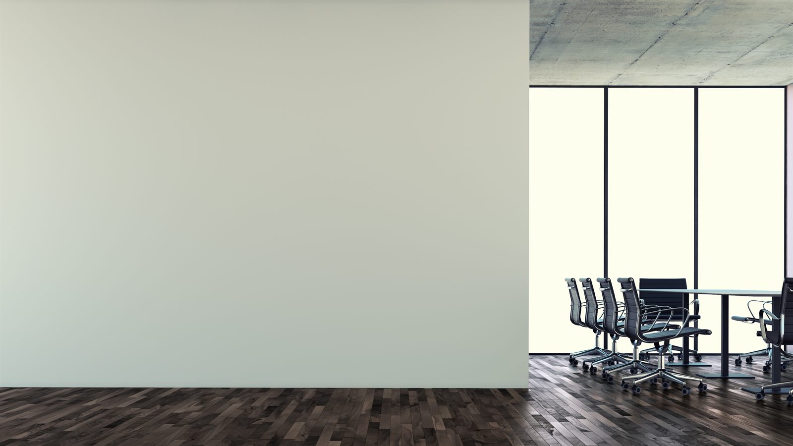 An empty conference room with a long table