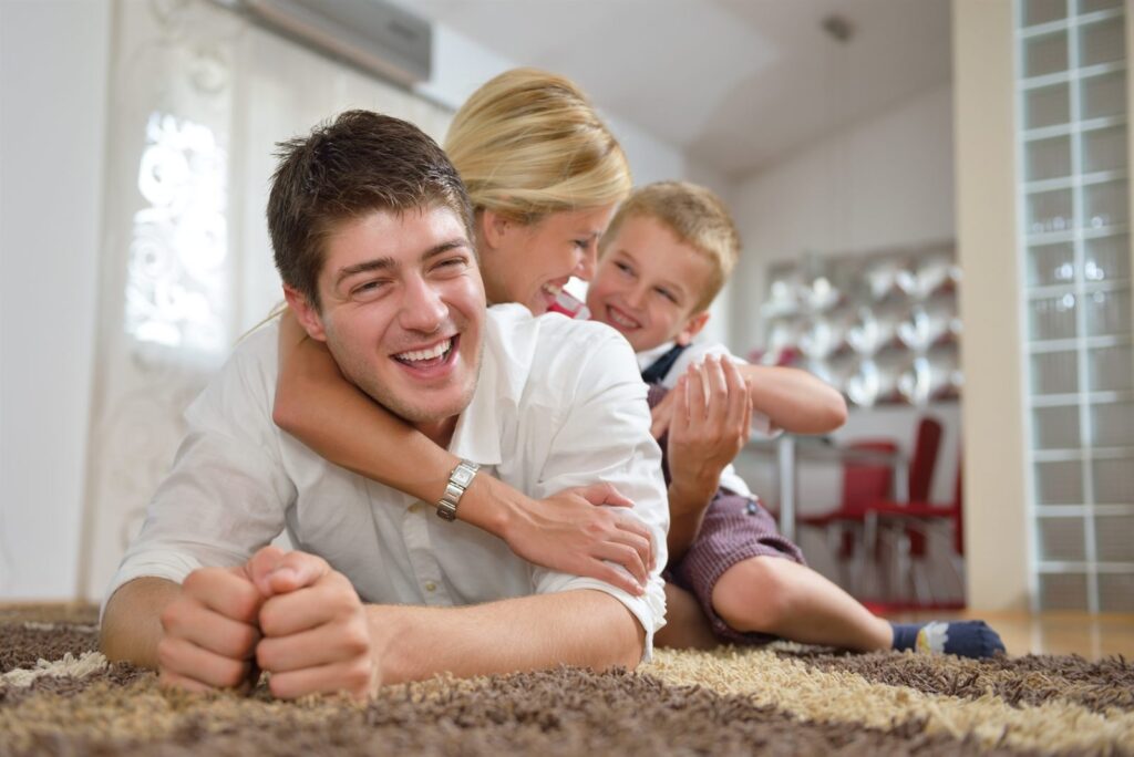 Young family with children at home