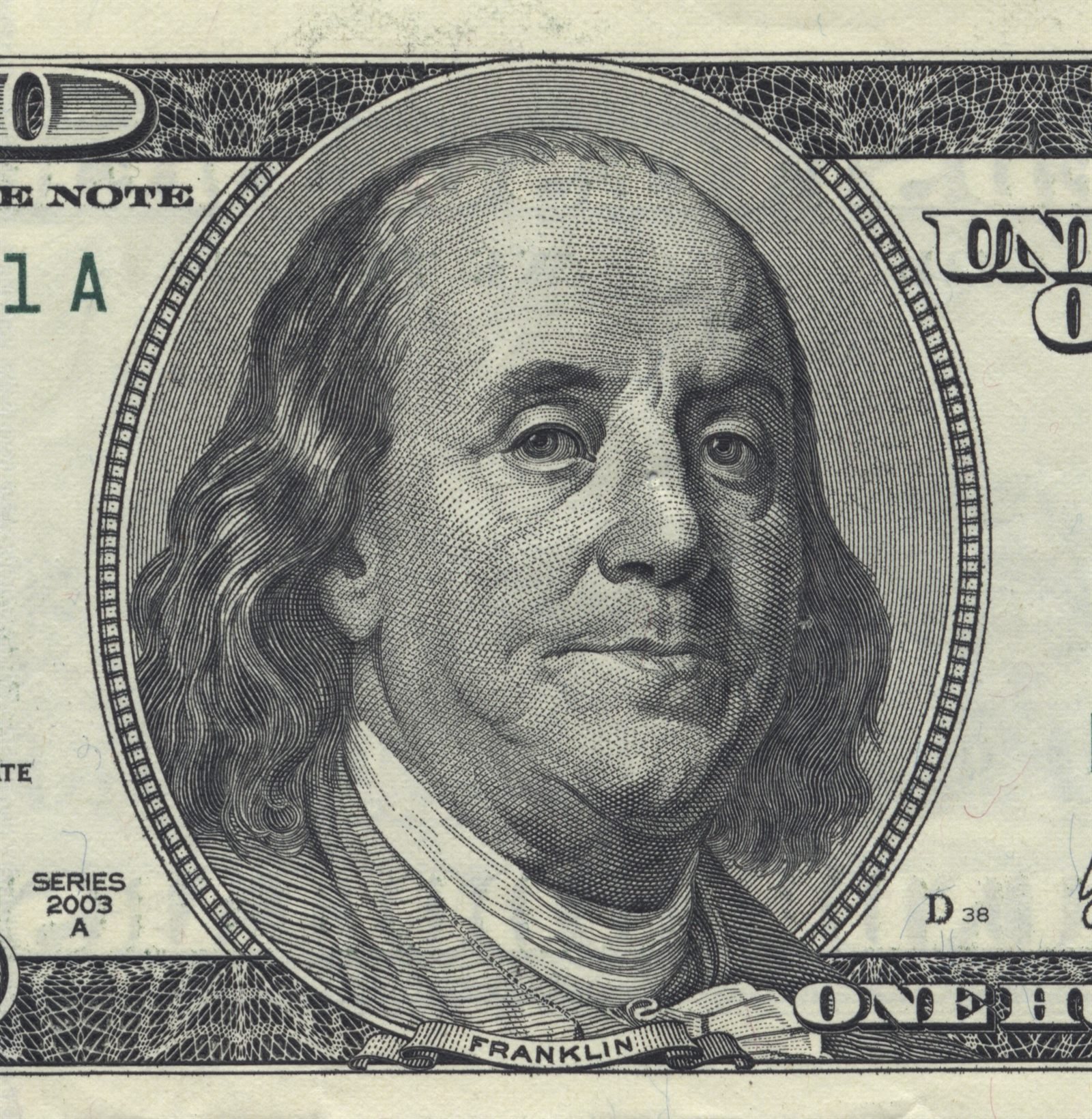 Close-up detail of a one hundred dollar bill