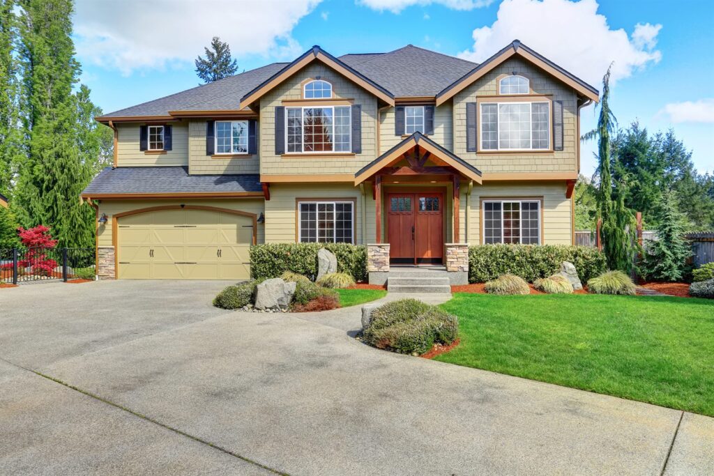 Large luxury home with a long driveway