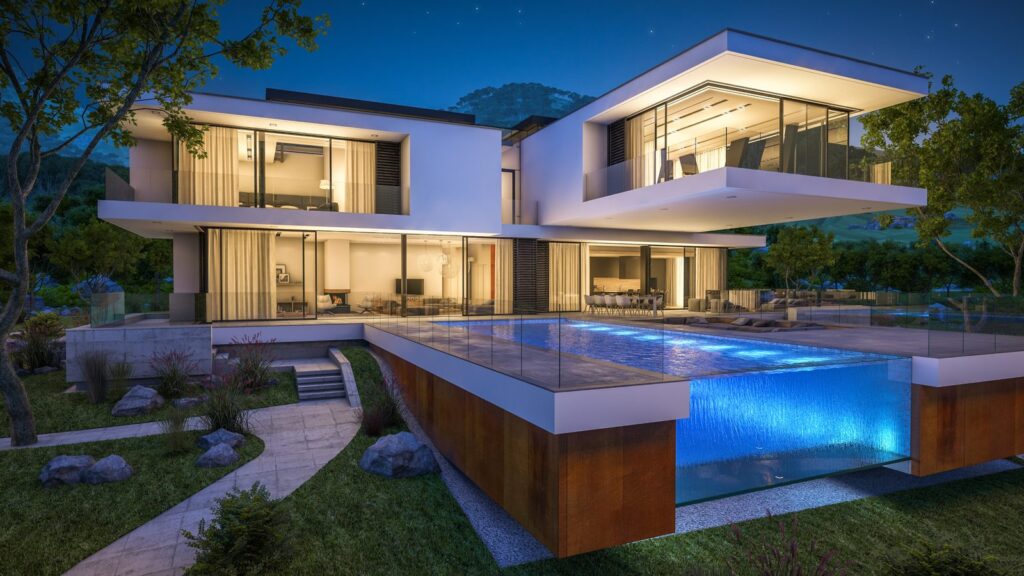 A modern luxury home with a lit pool at dusk, typical of jumbo loan financing