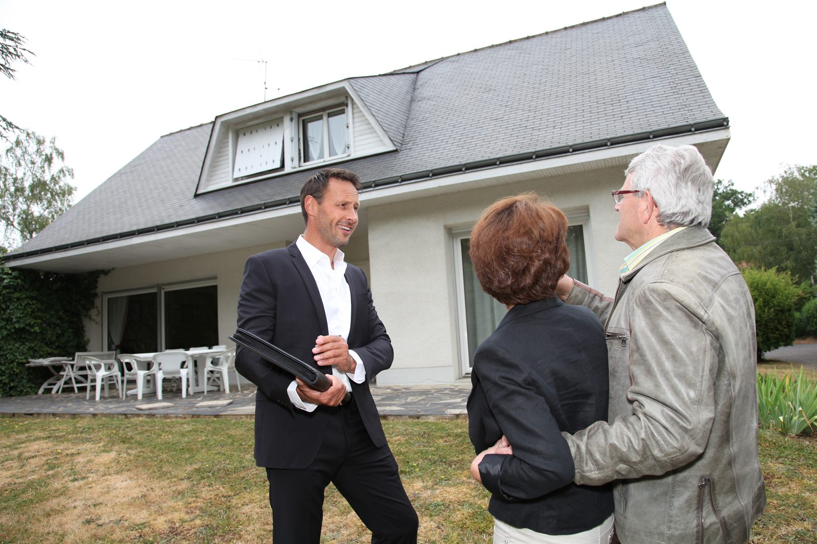 Loan officer reviewing options with a couple