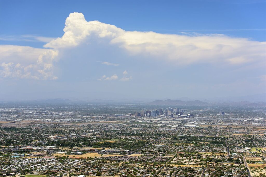 The Phoenix valley seen from above under a bank of cloud