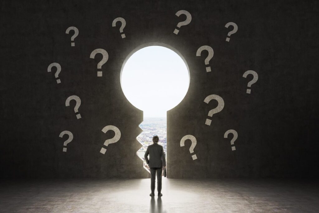Figure standing in a keyhole shaped opening