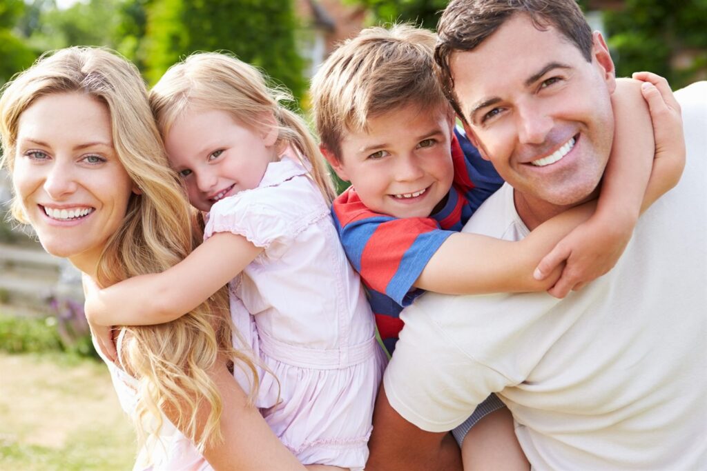Family together outdoors on a sunny day