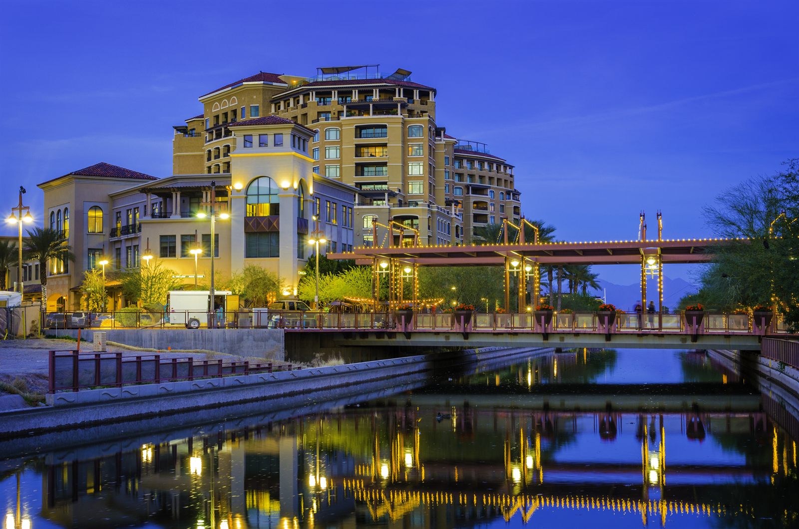 The canal in downtown Scottsdale, Arizona reflecting buildings at dusk