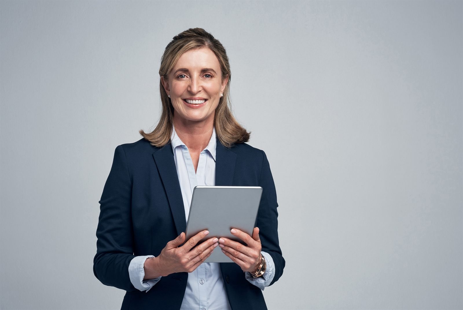 Professional woman holding a tablet